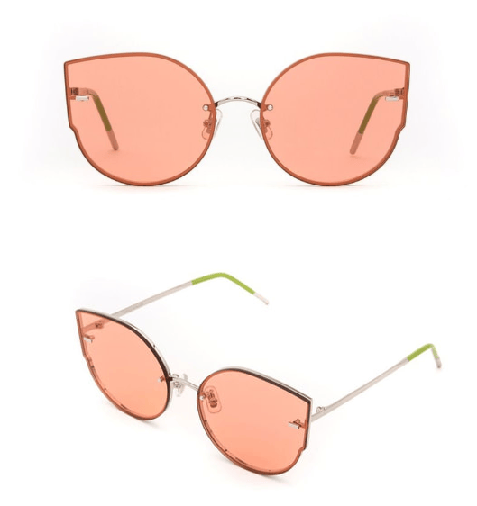 Stylish oversized sunglasses with light pink lenses and silver frames, displayed from two angles.